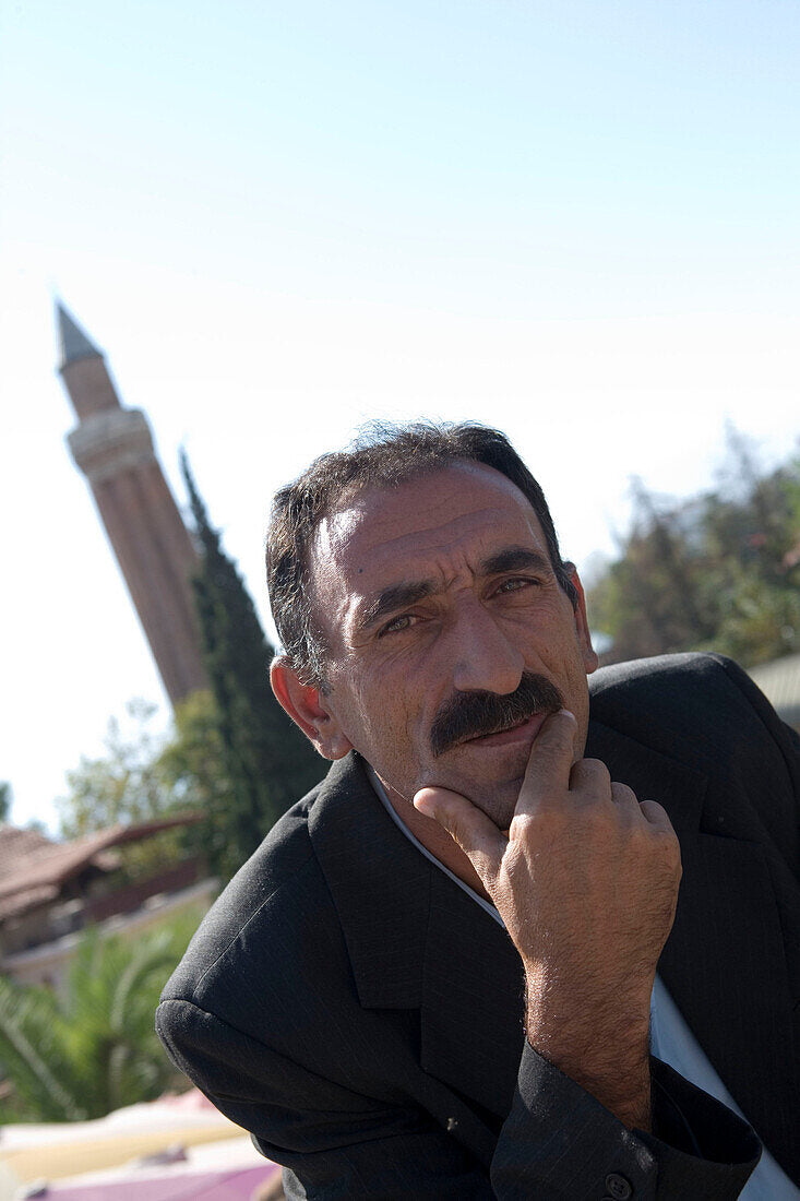 files/70055016-Turkish-Man-Mosque-Minaret-Old-Town-Antalya-Turkey.jpg